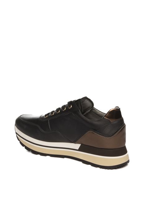 Black leather sneaker NERO GIARDINI | 411570GUANTO-100